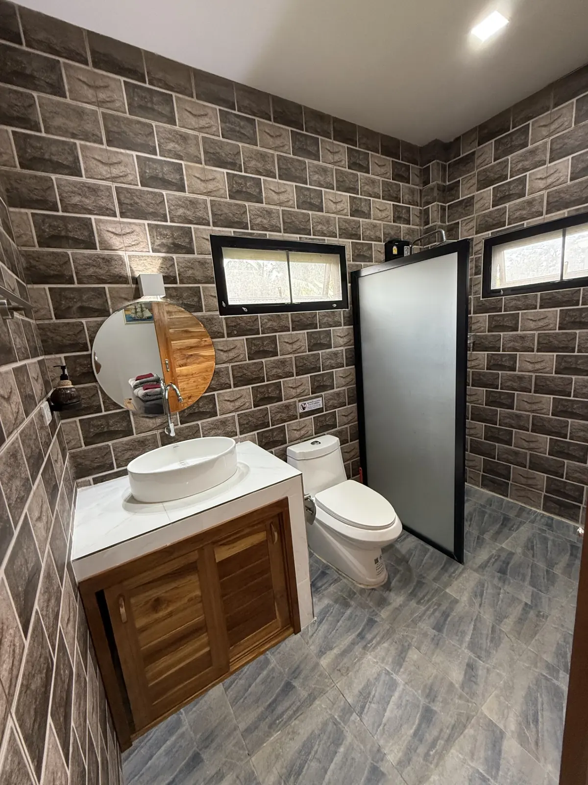 Private bathroom with shower inside the villa